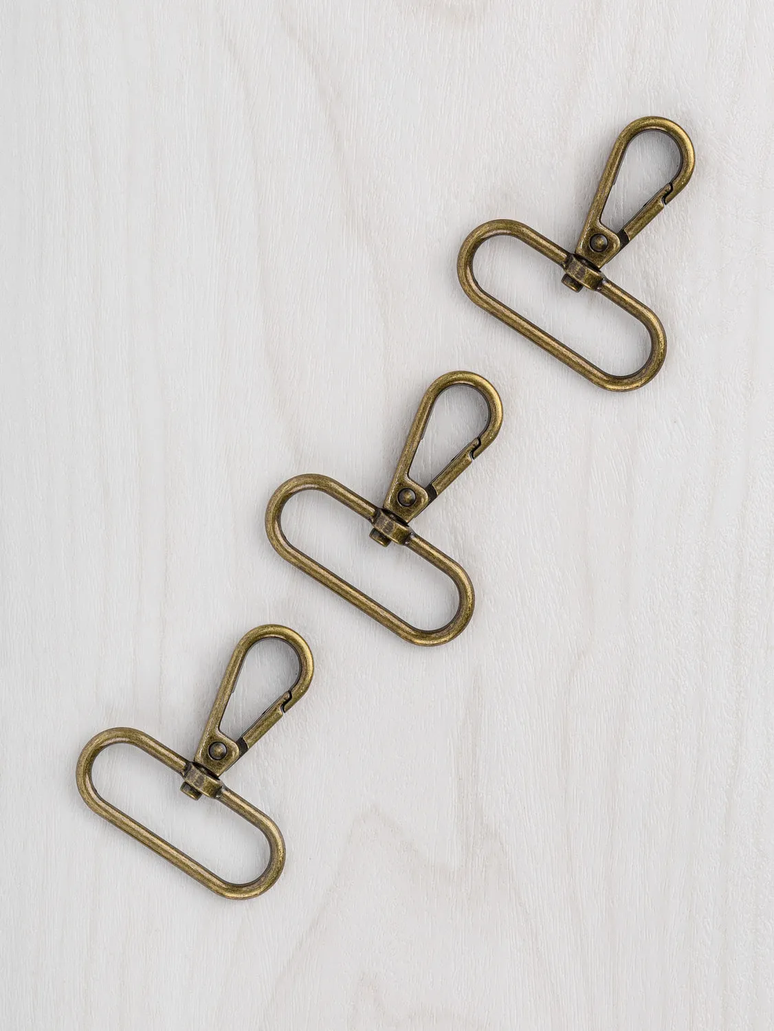 1.5" Swivel Hook Antique Brass - 3 pack